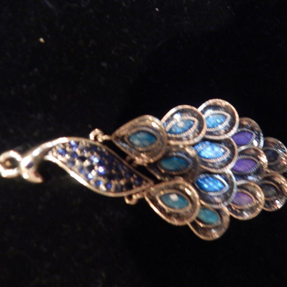 pendant necklace, matching earrings and bracelet